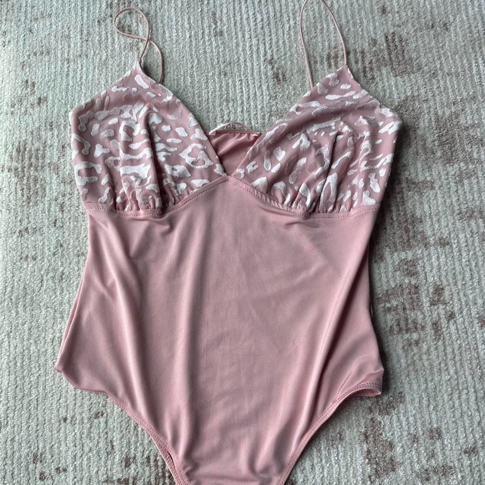 Sexy pink cheetah body suit